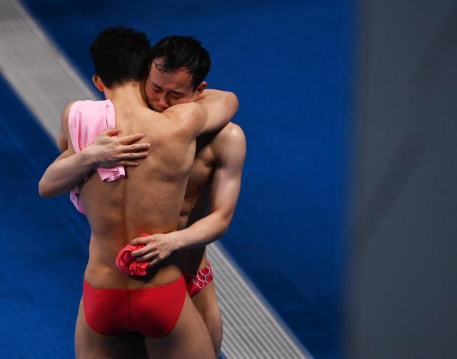 赛事直播-梦之队男单3米板揽金银 “绝代双骄”捍卫霸主地位